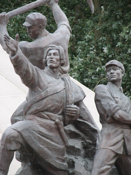 A statue just opposite the Potala Palace showing the Tibetans working hand in hand with the Chinese, building a better nation. Lhasa, Tibet.